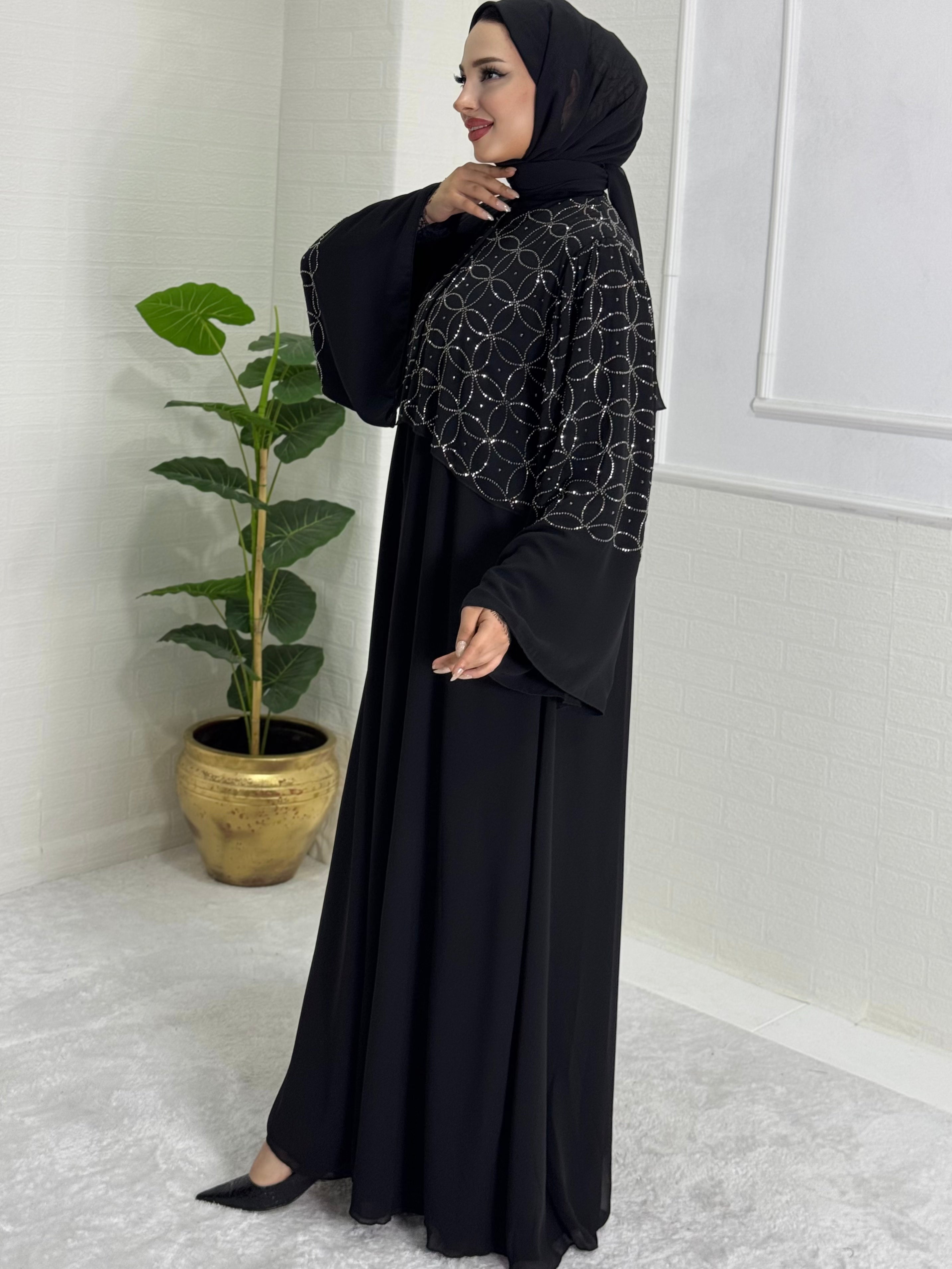 Black Abaya with Stones on the Upper Part