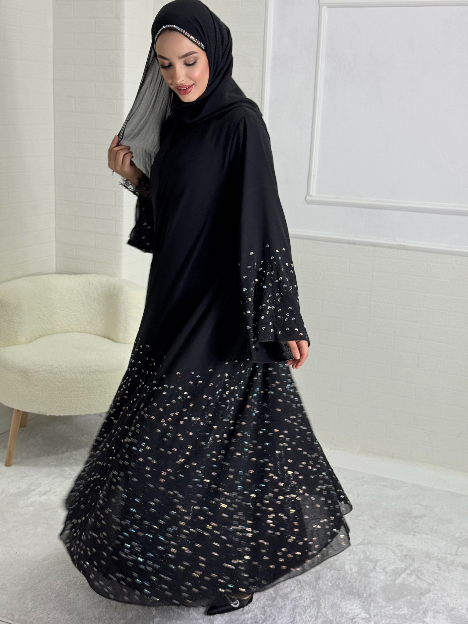 Black Abaya with Stoned Daisy Flower Motifs on the Skirt