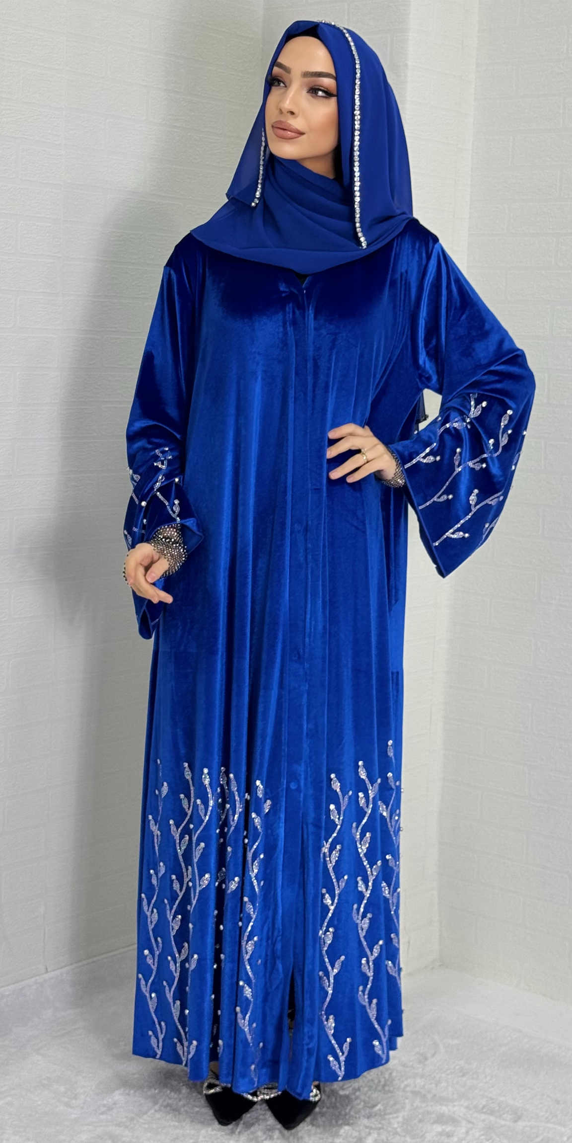 Blue velvet abaya with Swarovski branches on the hem