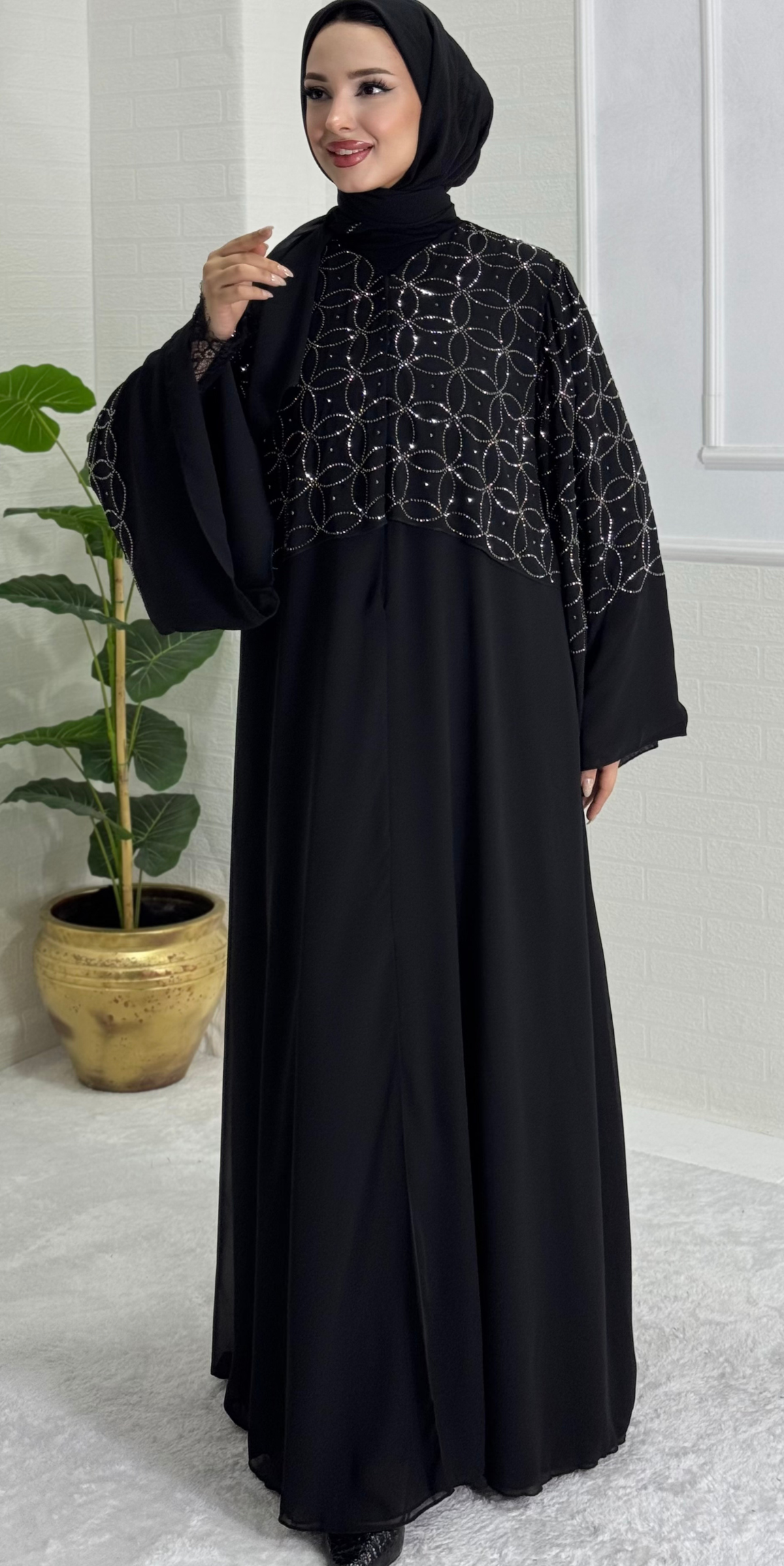 Black Abaya with Stones on the Upper Part