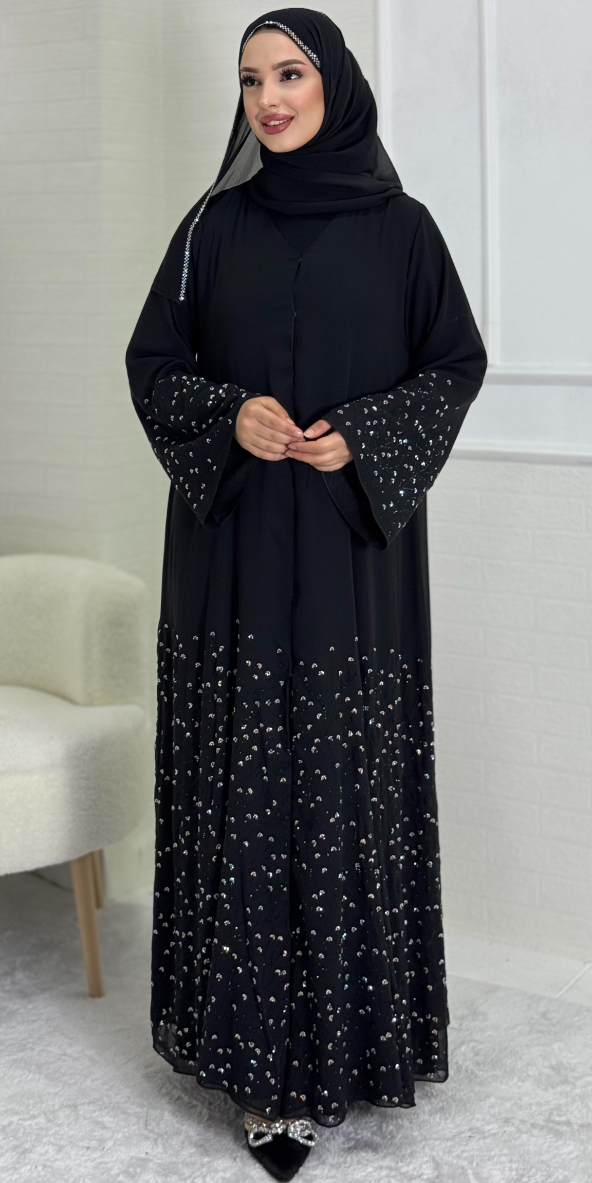 Black Abaya with Stoned Daisy Flower Motifs on the Skirt