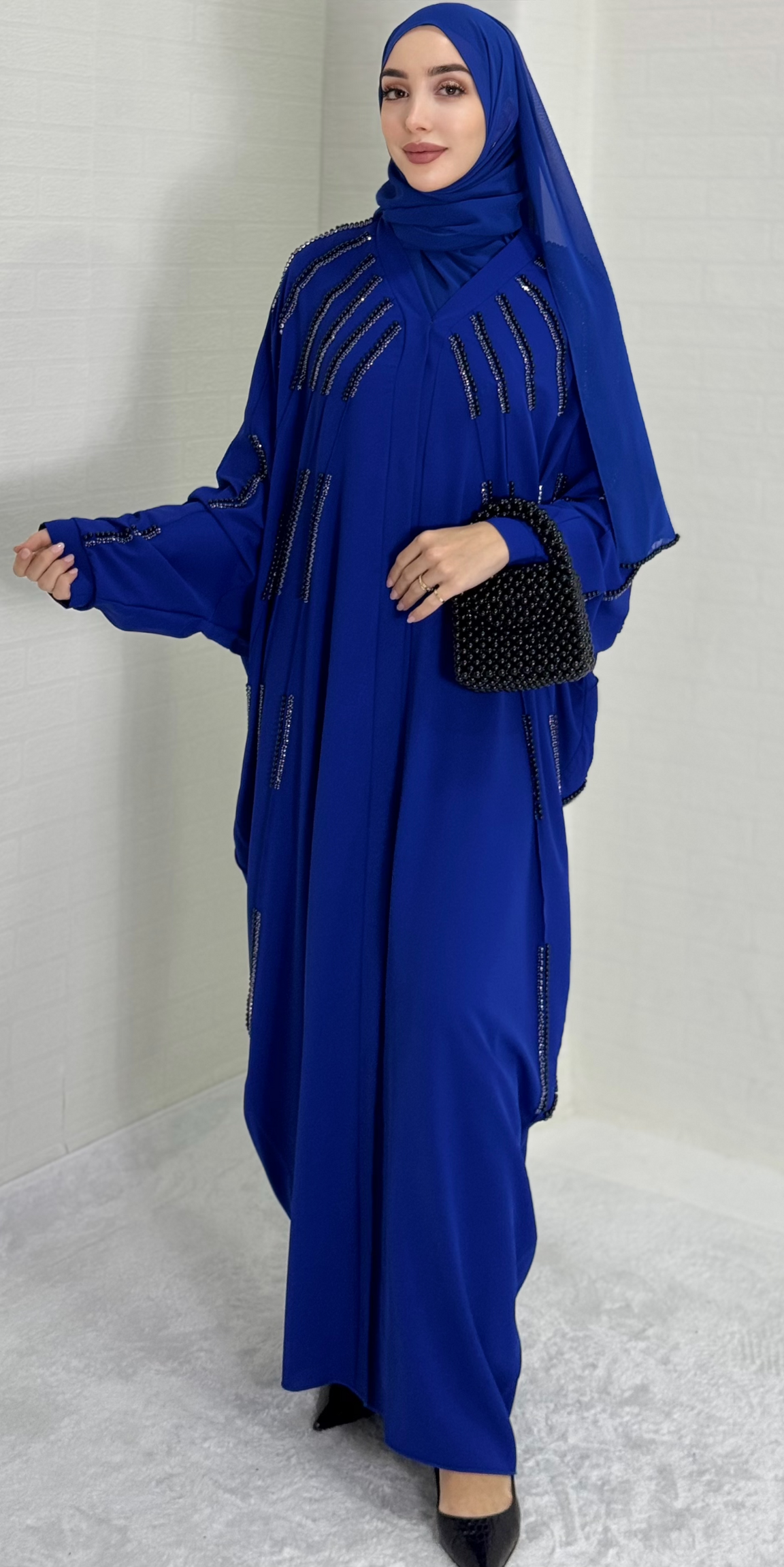 Chiffon Blue Abaya with Pearls and Black Stones on the Front