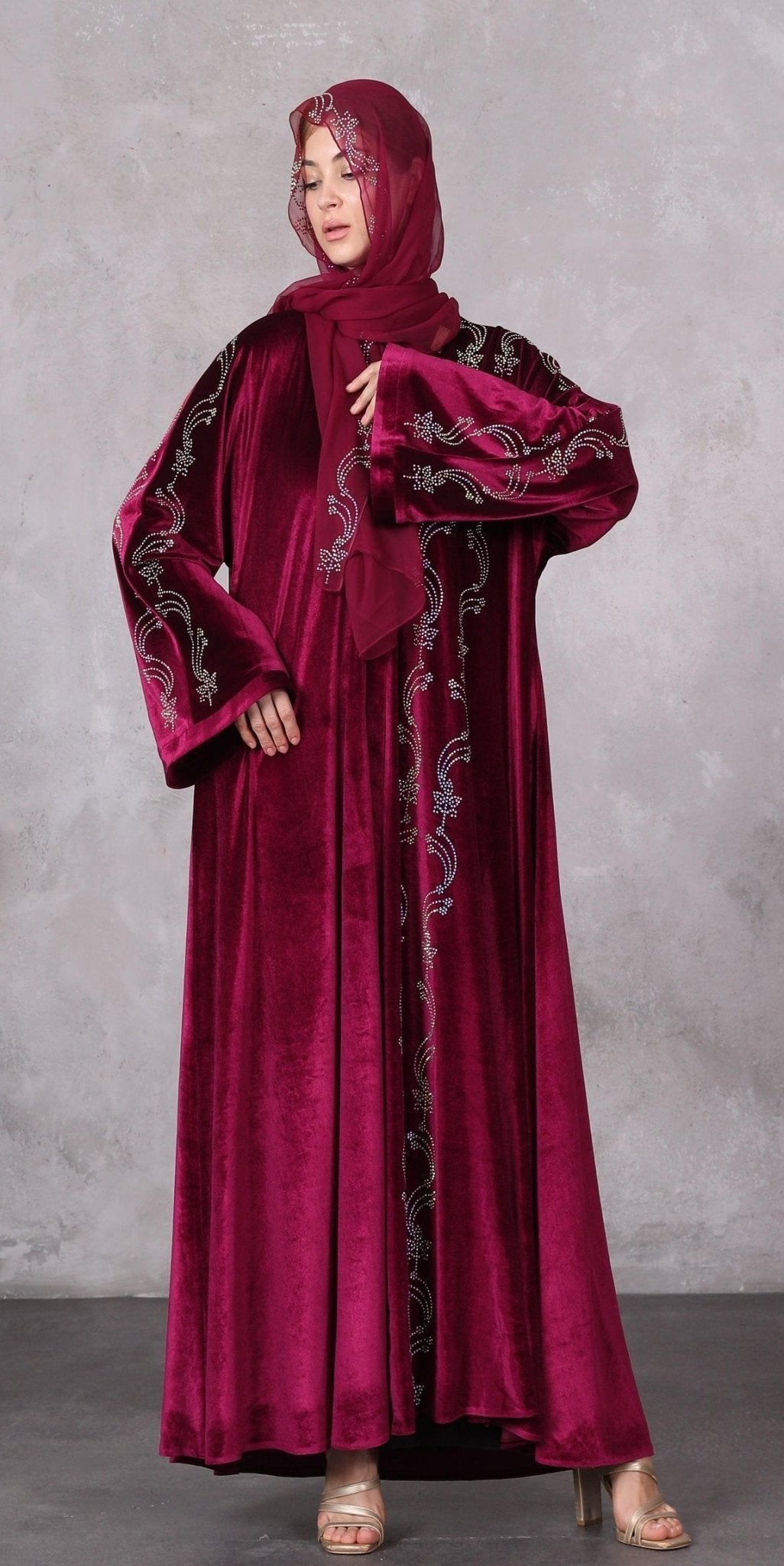 Crimson Luxury: Red Velvet Abaya with Rainbow Embroidered Stones - Emirati Abaya TRCrimson Luxury: Red Velvet Abaya with Rainbow Embroidered Stones