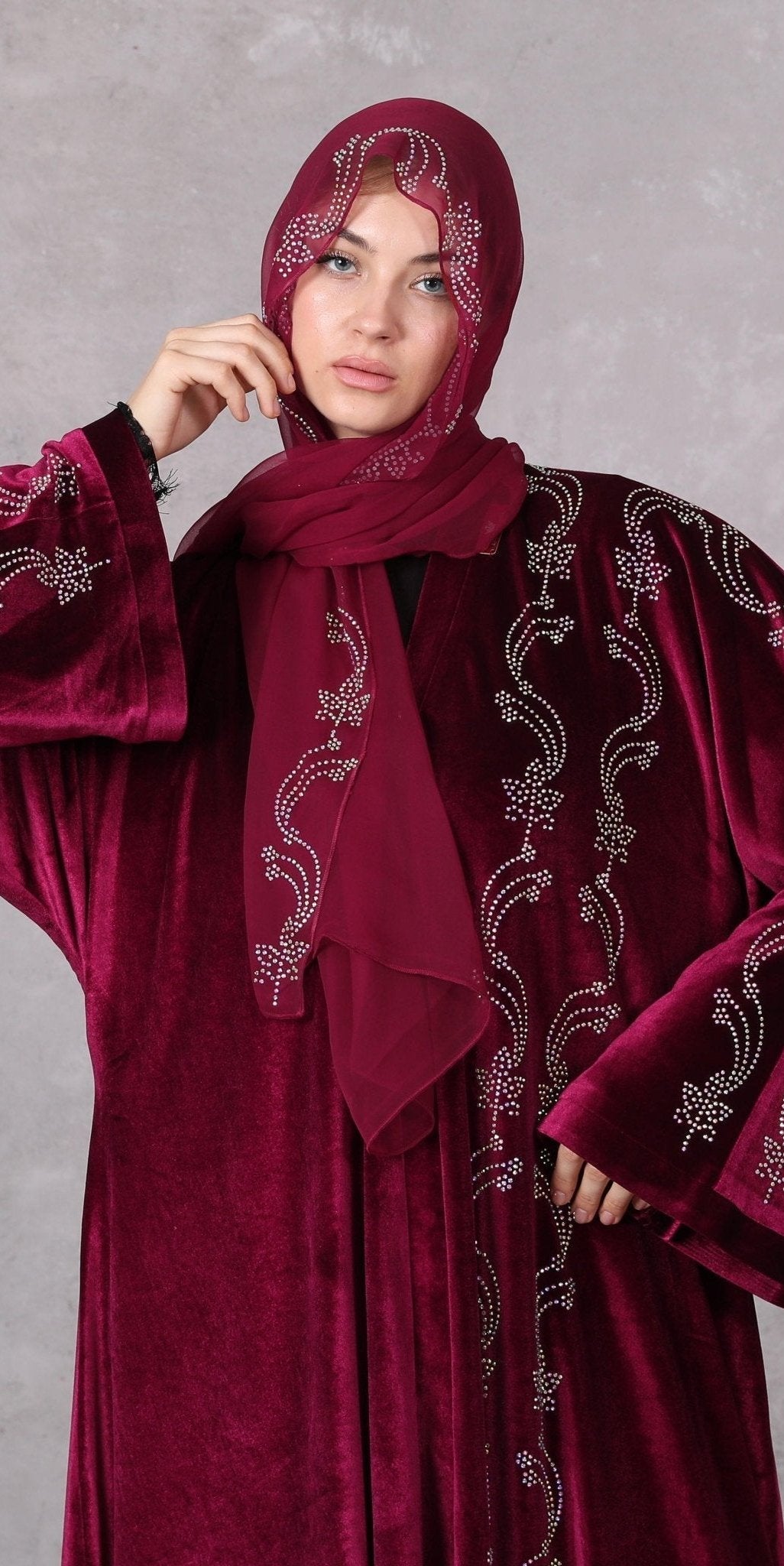 Crimson Luxury: Red Velvet Abaya with Rainbow Embroidered Stones - Emirati Abaya TRCrimson Luxury: Red Velvet Abaya with Rainbow Embroidered Stones