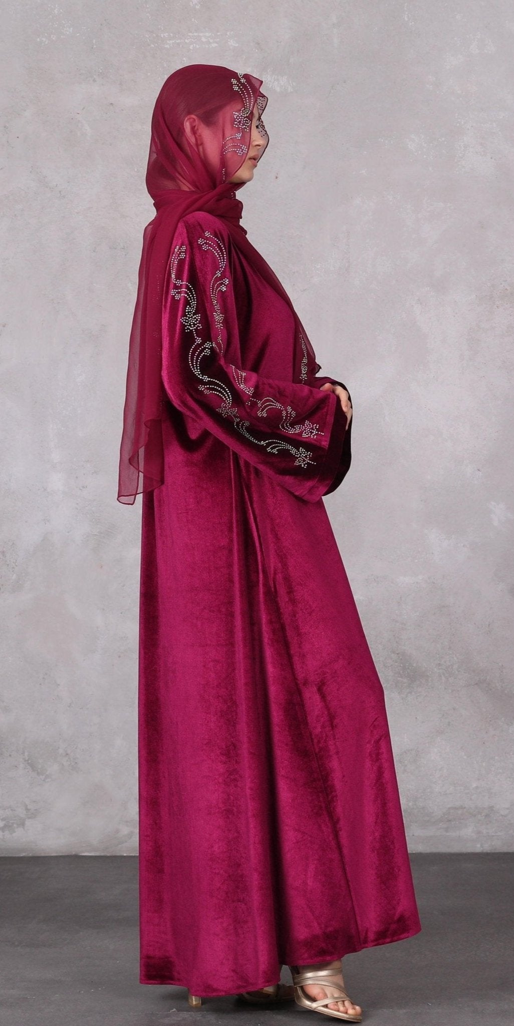 Crimson Luxury: Red Velvet Abaya with Rainbow Embroidered Stones - Emirati Abaya TRCrimson Luxury: Red Velvet Abaya with Rainbow Embroidered Stones